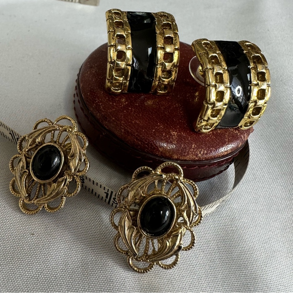 Two pair of vintage goldtone and black earrings